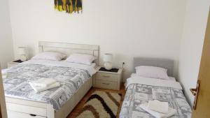 Ένα ή περισσότερα κρεβάτια σε δωμάτιο στο Apartment Milica