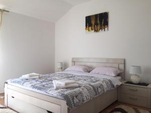 Ένα ή περισσότερα κρεβάτια σε δωμάτιο στο Apartment Milica