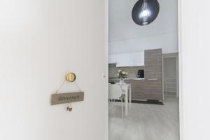 Kuchyň nebo kuchyňský kout v ubytování Domy House + 9 fotografií