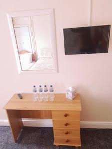 TV a/nebo společenská místnost v ubytování Billycan Guest Rooms + 14 fotografií