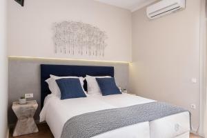 Posteľ alebo postele v izbe v ubytovaní Anemone Holiday Apartment