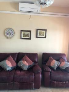 Malibu Playa Apartamento的休息区