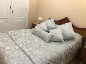 Malibu Playa Apartamento客房内的一张或多张床位
