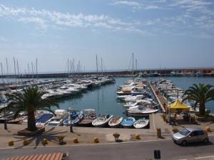 a bunch of boats parked in a marina at Casa Di Nonna Pina in Marina di Camerota