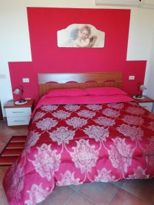 A bed or beds in a room at La Sorgente Del Subasio ASSISI