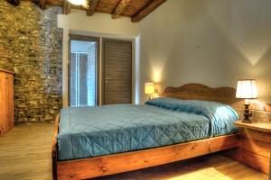 Postel nebo postele na pokoji v ubytování Cascina del Sole
