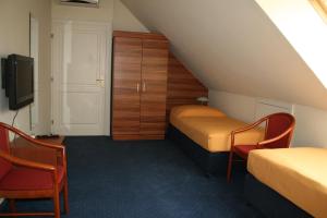 Sjónvarps- og/eða afþreyingartæki á Főnix Hotel