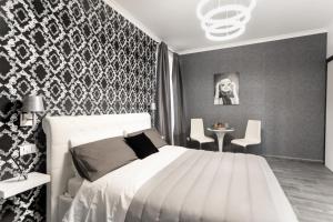 Postel nebo postele na pokoji v ubytování B&B Notti d'Oriente