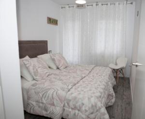 Posteľ alebo postele v izbe v ubytovaní Apartamento de Sonia II