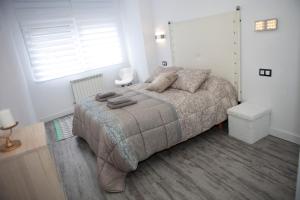 Posteľ alebo postele v izbe v ubytovaní Apartamento de Sonia II