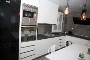 Kuchyňa alebo kuchynka v ubytovaní Apartamento de Sonia II