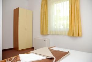 Postel nebo postele na pokoji v ubytování Villa Obad Guest House