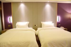 Lavande Hotel (Yichun Wanzai Ancient Town) 객실 침대