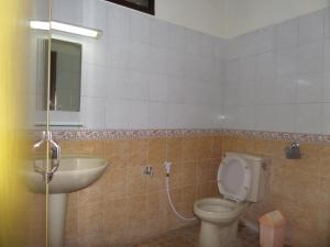 Koupelna v ubytování Armi Hotel Malang