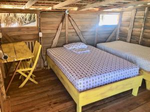 
Ein Bett oder Betten in einem Zimmer der Unterkunft Buen Hombre Kite School with Accommodations
