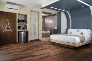 En eller flere senger på et rom på HOTEL EIFFEL