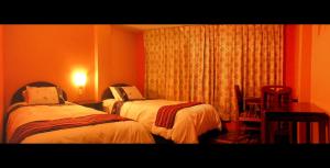 Cama o camas de una habitación en Hotel Margarita