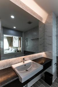 Koupelna v ubytování The 8 Hotel Udonthani