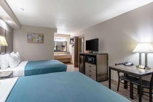 Voodi või voodid majutusasutuse Econo Lodge Kingsville toas