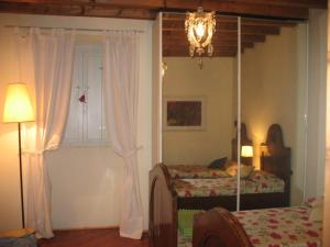 Postel nebo postele na pokoji v ubytování B&B A Casa Di Andrea