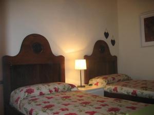 Postel nebo postele na pokoji v ubytování B&B A Casa Di Andrea