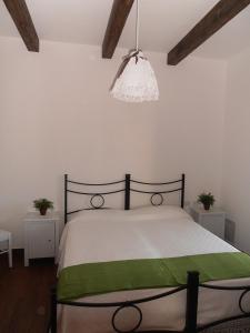 Ένα ή περισσότερα κρεβάτια σε δωμάτιο στο Masseria Nonna Angela