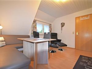 Uma TV ou centro de entretenimento em Pretty Apartment in Oppenau near Black Forest National Park