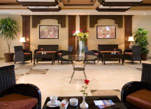 A seating area at Swiss Inn Plaza Hotel