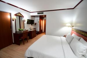 Sjónvarps- og/eða afþreyingartæki á Wangcome Hotel