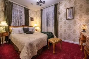 Posteľ alebo postele v izbe v ubytovaní Rezydencja Grawert Boutique & Spa
