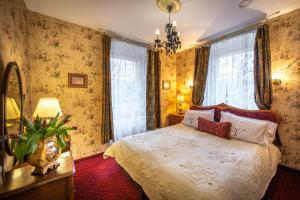 Posteľ alebo postele v izbe v ubytovaní Rezydencja Grawert Boutique & Spa