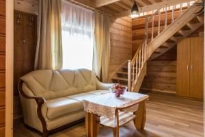 Posedenie v ubytovaní udanypobyt Apartamenty Przy Lesie 2