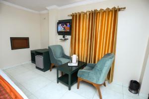 TV a/nebo společenská místnost v ubytování Hotel Jaisingh Palace