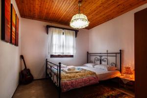 Postel nebo postele na pokoji v ubytování Villa Achilleas