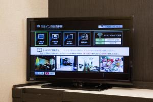 En TV eller et underholdningssystem på Sanco Inn Yokkaichi Ekimae