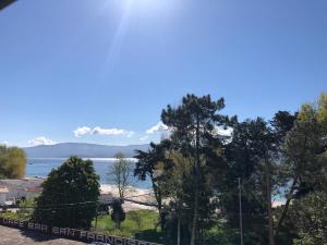 a view of the beach from the house at Pension Antonio in Louro