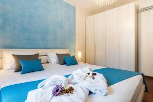 Posteľ alebo postele v izbe v ubytovaní Apartment Auretta