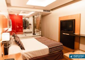 מיטה או מיטות בחדר ב-Motel Portofino