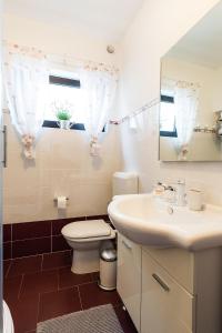 Kúpeľňa v ubytovaní Apartment Auretta