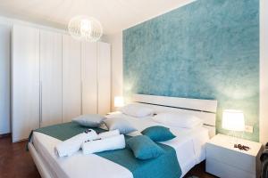 Posteľ alebo postele v izbe v ubytovaní Apartment Auretta