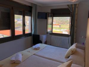 Ein Bett oder Betten in einem Zimmer der Unterkunft Casa Blanco Conde