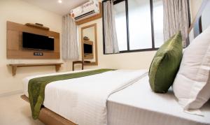 Cama ou camas em um quarto em Hotel Residency Park
