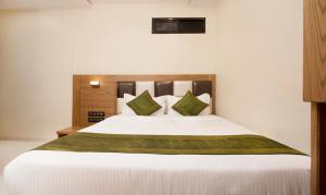 Postel nebo postele na pokoji v ubytování Hotel Residency Park