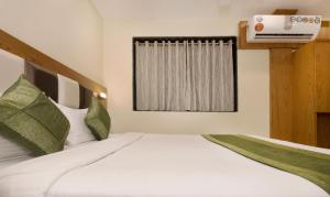 Postel nebo postele na pokoji v ubytování Hotel Residency Park