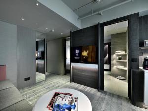 Sjónvarps- og/eða afþreyingartæki á Xi Hotel