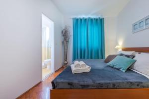 Postel nebo postele na pokoji v ubytování Luxury apartment Tara