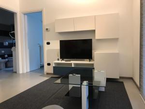 TV a/nebo společenská místnost v ubytování Hotel Residence Alessandra