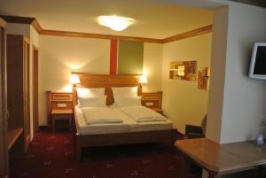 Postel nebo postele na pokoji v ubytování Hotel Jägerhof