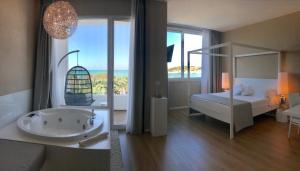 A bed or beds in a room at Hotel Gargano