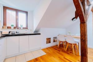 Kuchyňa alebo kuchynka v ubytovaní Atticus Apartments
